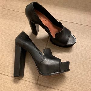 Elizabeth and James Black Heels